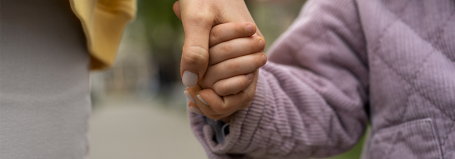 Illustration of two people holding hand