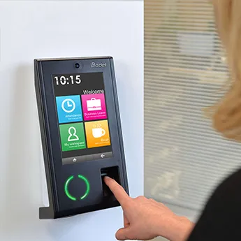 A networked touchscreen clocking terminal