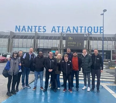 Image shows the Kelio UK team outside Nantes Atlantique airport